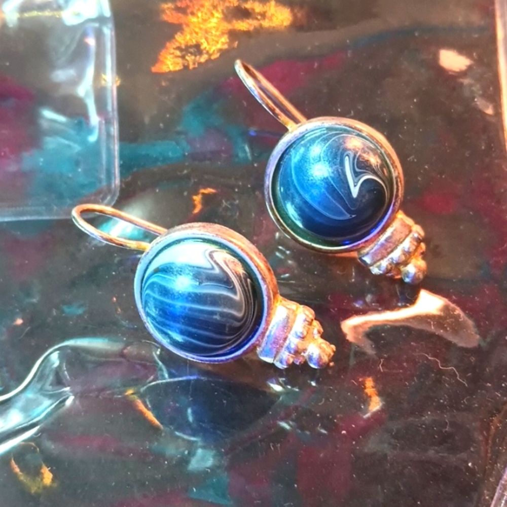 Silver earrings with blue and white stone